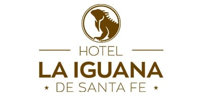Hotel La Iguana de Santa Fe logo featuring an iguana silhouette in a circular emblem with gold text